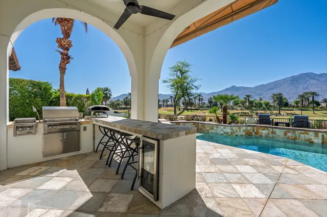 a view of a house with a swimming pool