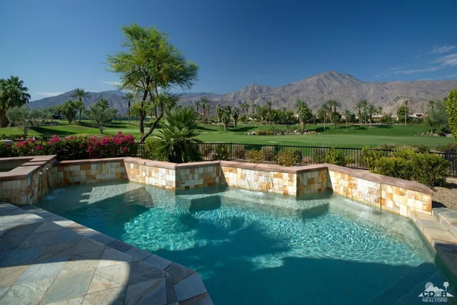 a view of a lake view with a garden