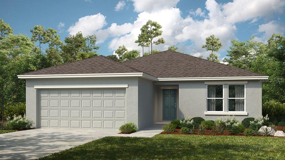 311 Riverfront Way Edgewater, FL 32141 - Photo 1 of 1 a front view of a house with a yard and garage