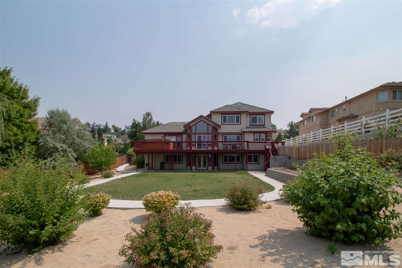 13335 Rim Rock Drive Reno, NV 89521 - Photo 23 of 25 a view of a house with a yard and sitting area