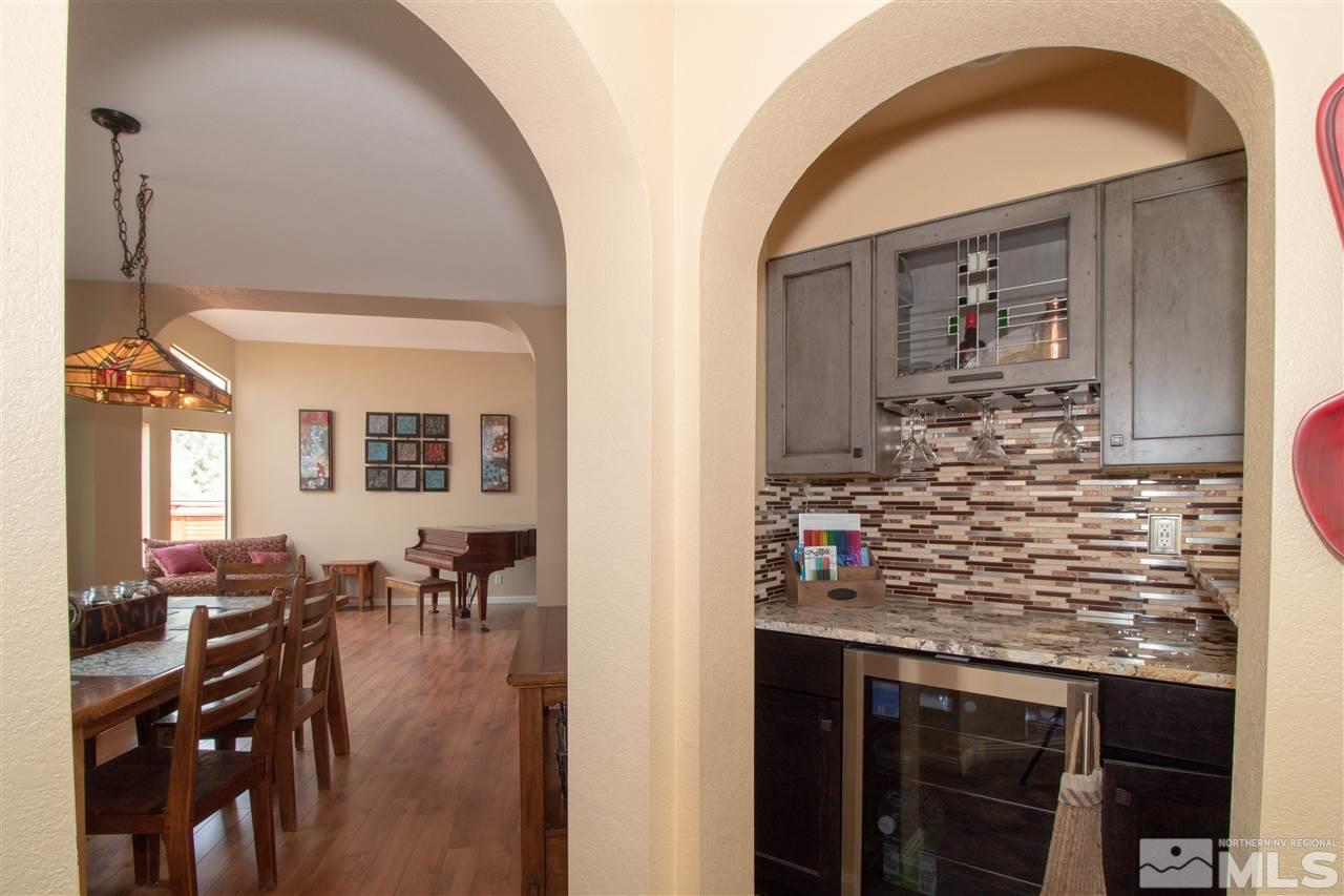 13335 Rim Rock Drive Reno, NV 89521 - Photo 7 of 25 a kitchen view with table and chairs