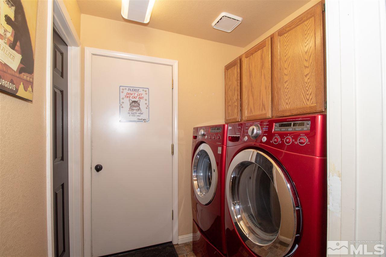 13335 Rim Rock Drive Reno, NV 89521 - Photo 9 of 25 a utility room with dryer and washer