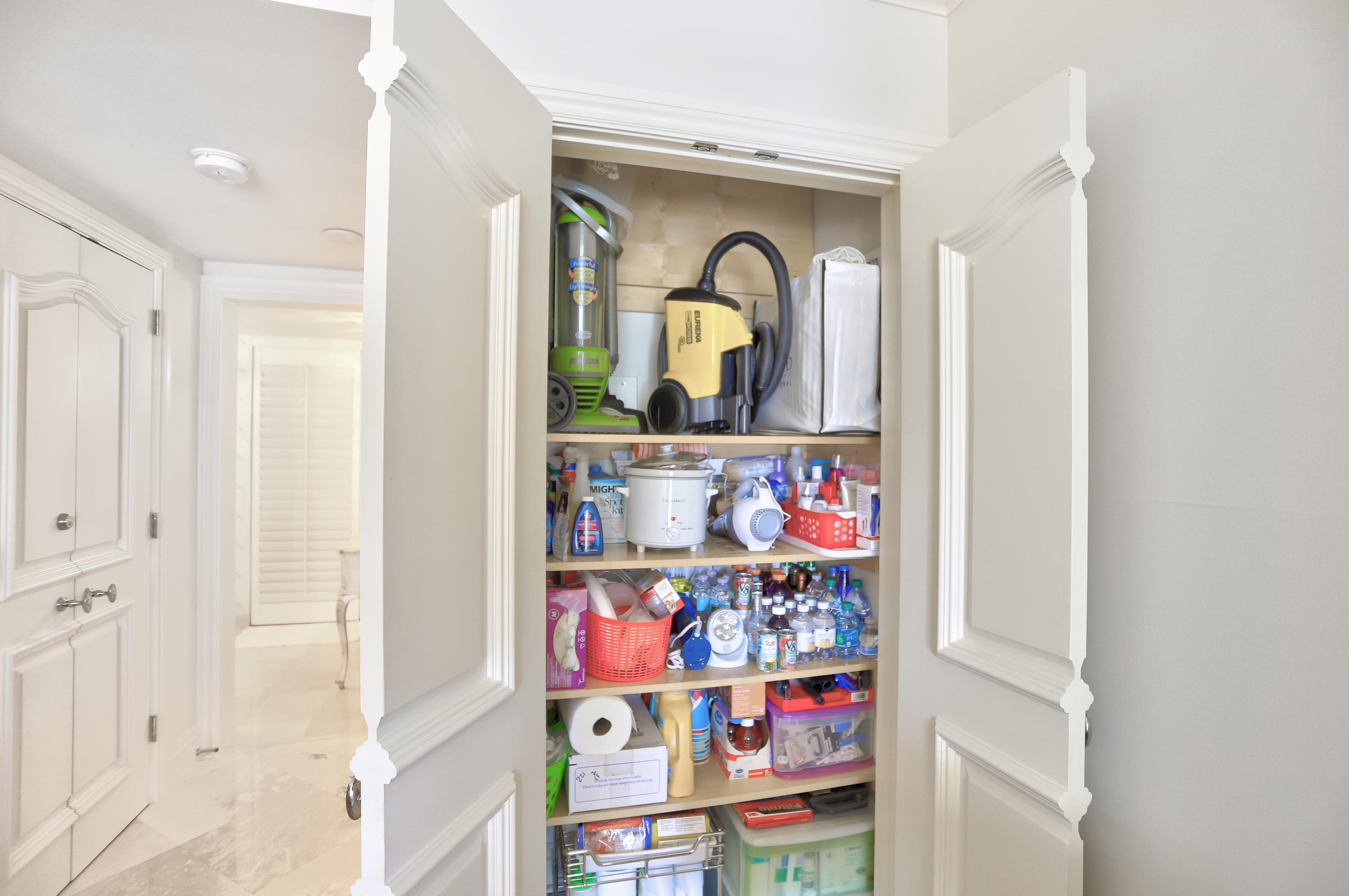 99 Southeast Mizner Boulevard, Unit 221 Boca Raton, FL 33432 - Photo 28 of 50 Pantry w/Custom Wood Core Doors