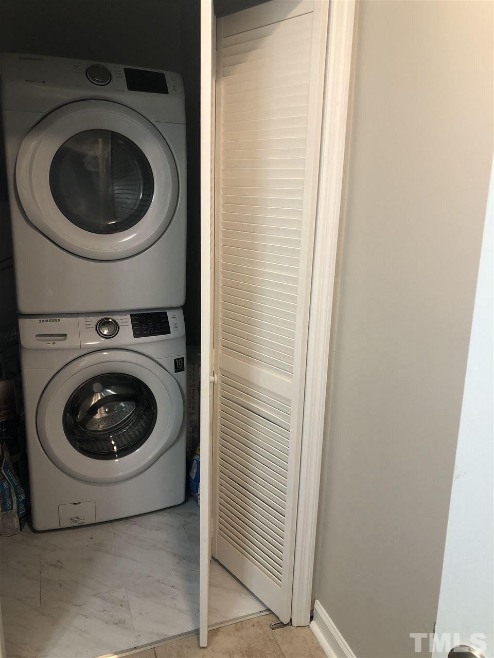 4244 Lake Ridge Drive, Unit 12B Raleigh, NC 27604 - Photo 4 of 28 a utility room with dryer and washer
