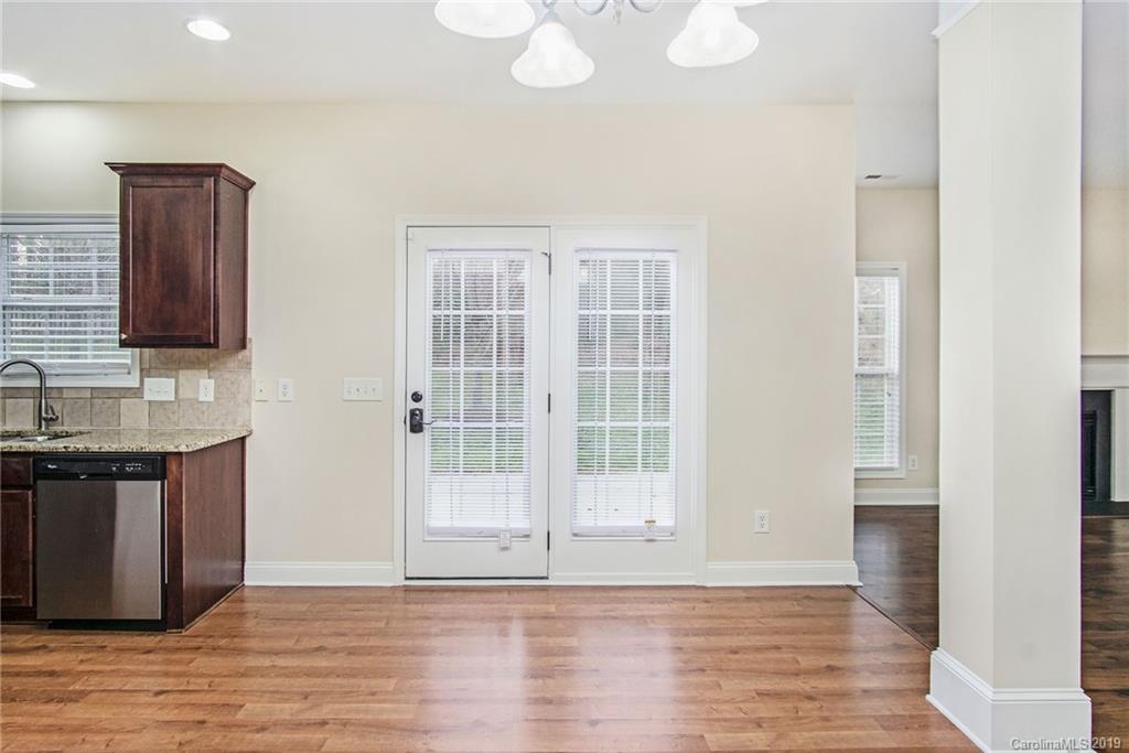 3727 Burnage Hall Road Harrisburg, NC 28075 - Photo 11 of 21 a view of a kitchen with a sink and a window