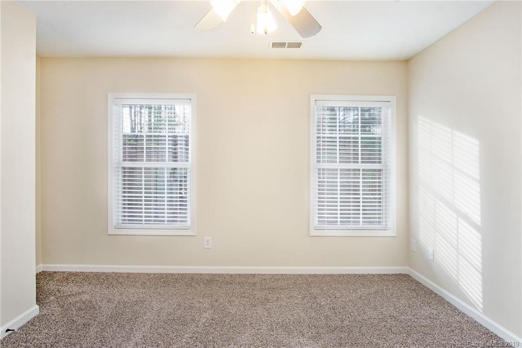 3727 Burnage Hall Road Harrisburg, NC 28075 - Photo 20 of 21 an empty room with a window