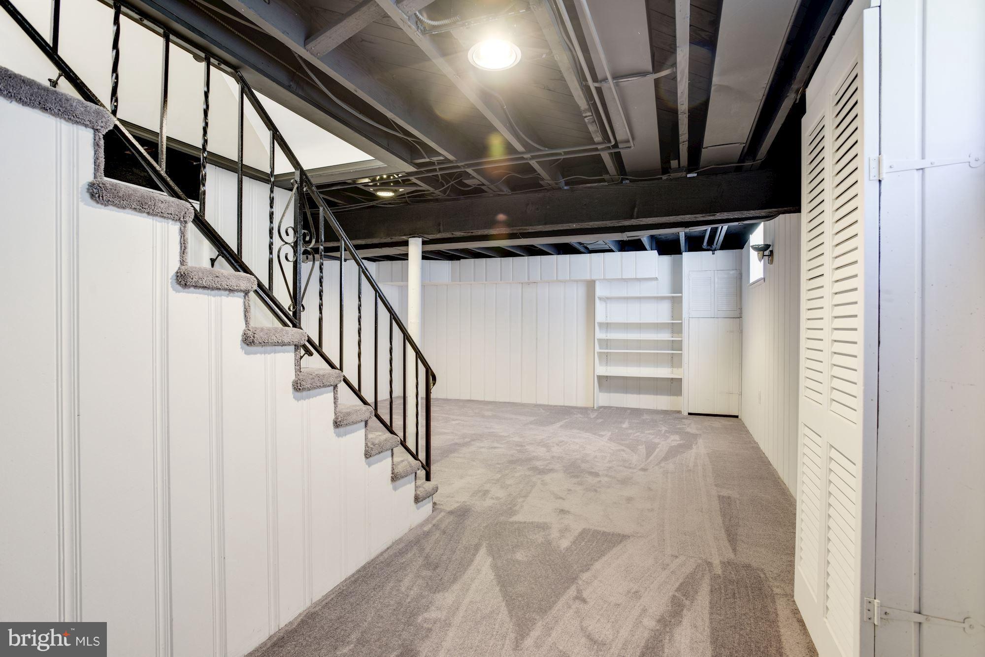 6410 Sherwood Road Baltimore, MD 21239 - Photo 22 of 30 Perfect playroom or den