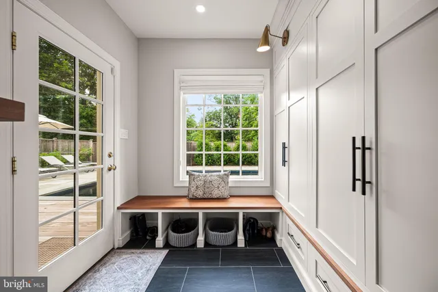 a view of a kitchen with a large window