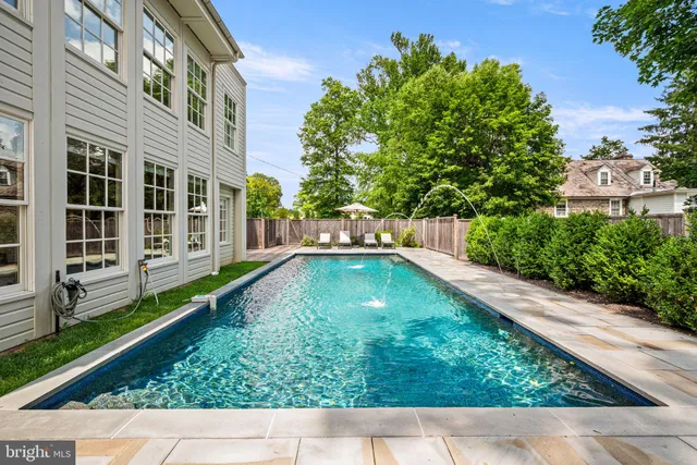 a view of house with a yard