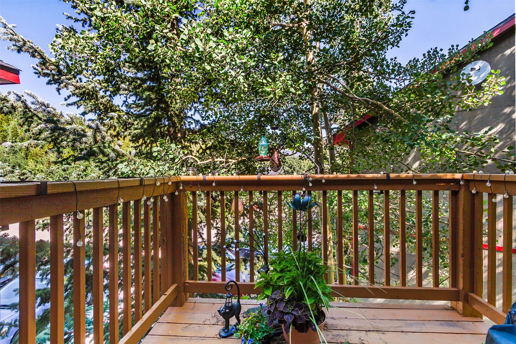 304 Illinois Gulch Road, Unit 204 Breckenridge, CO 80424 - Photo 5 of 13 a balcony with wooden floor