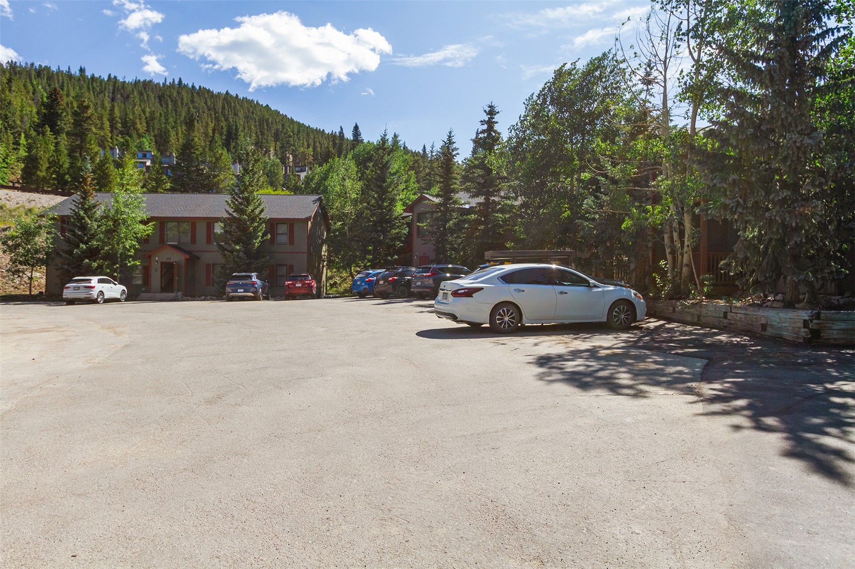 304 Illinois Gulch Road, Unit 204 Breckenridge, CO 80424 - Photo 10 of 13 a car parked in front of a house