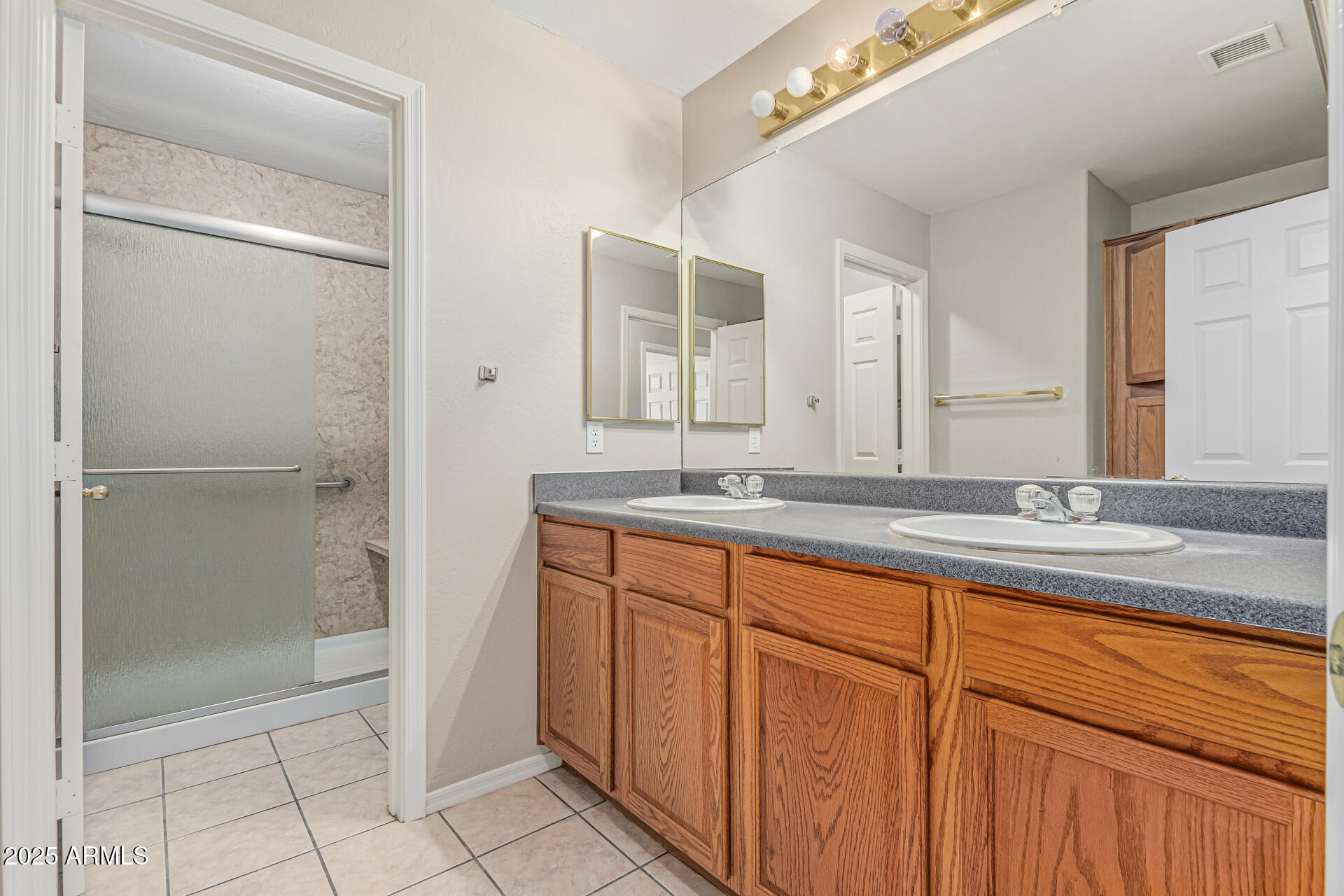 2264 South Belair Road Apache Junction, AZ 85119 - Photo 13 of 19 a bathroom with a granite countertop sink mirror and