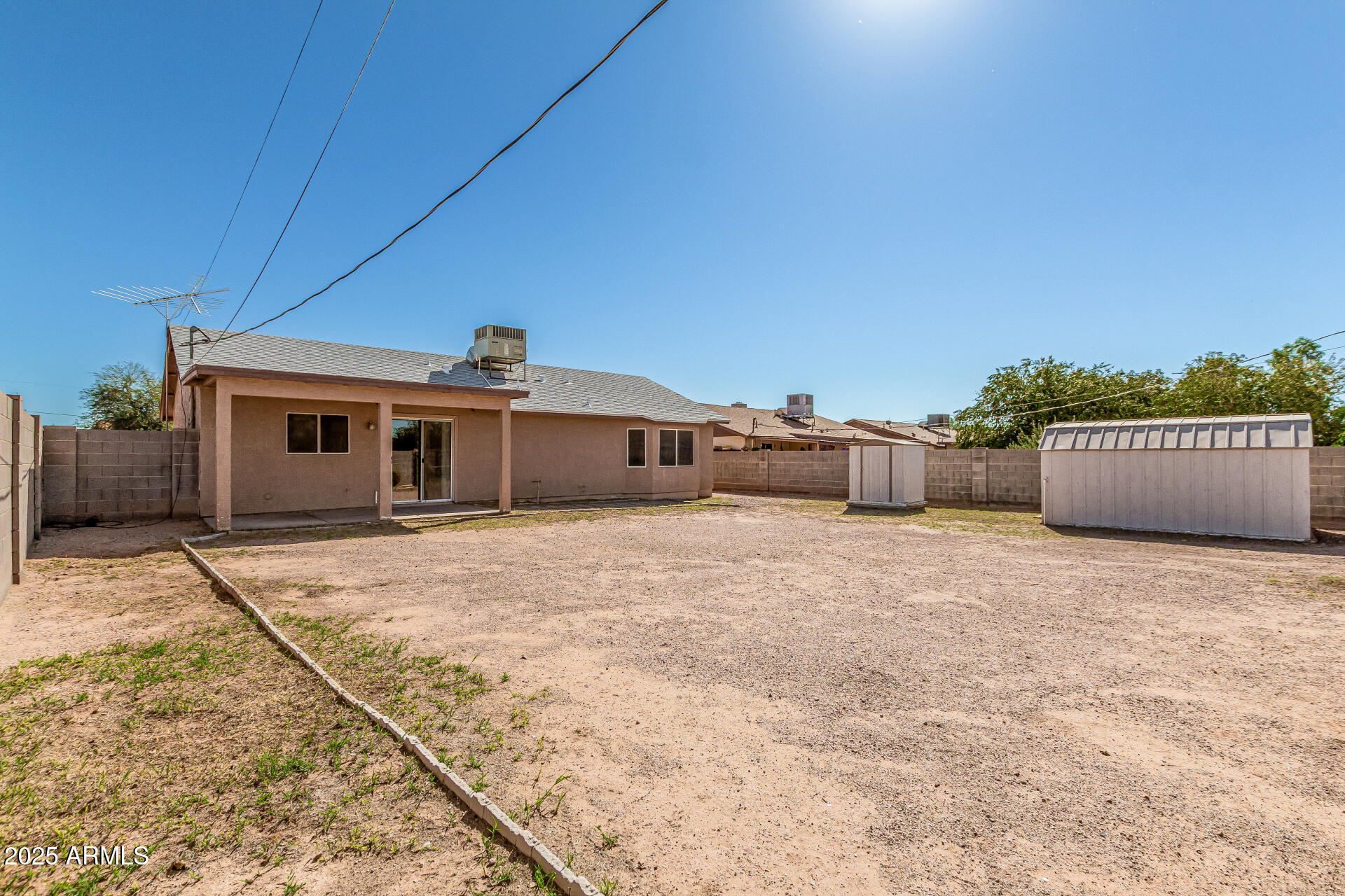 2264 South Belair Road Apache Junction, AZ 85119 - Photo 17 of 19 a front view of a house with a garage
