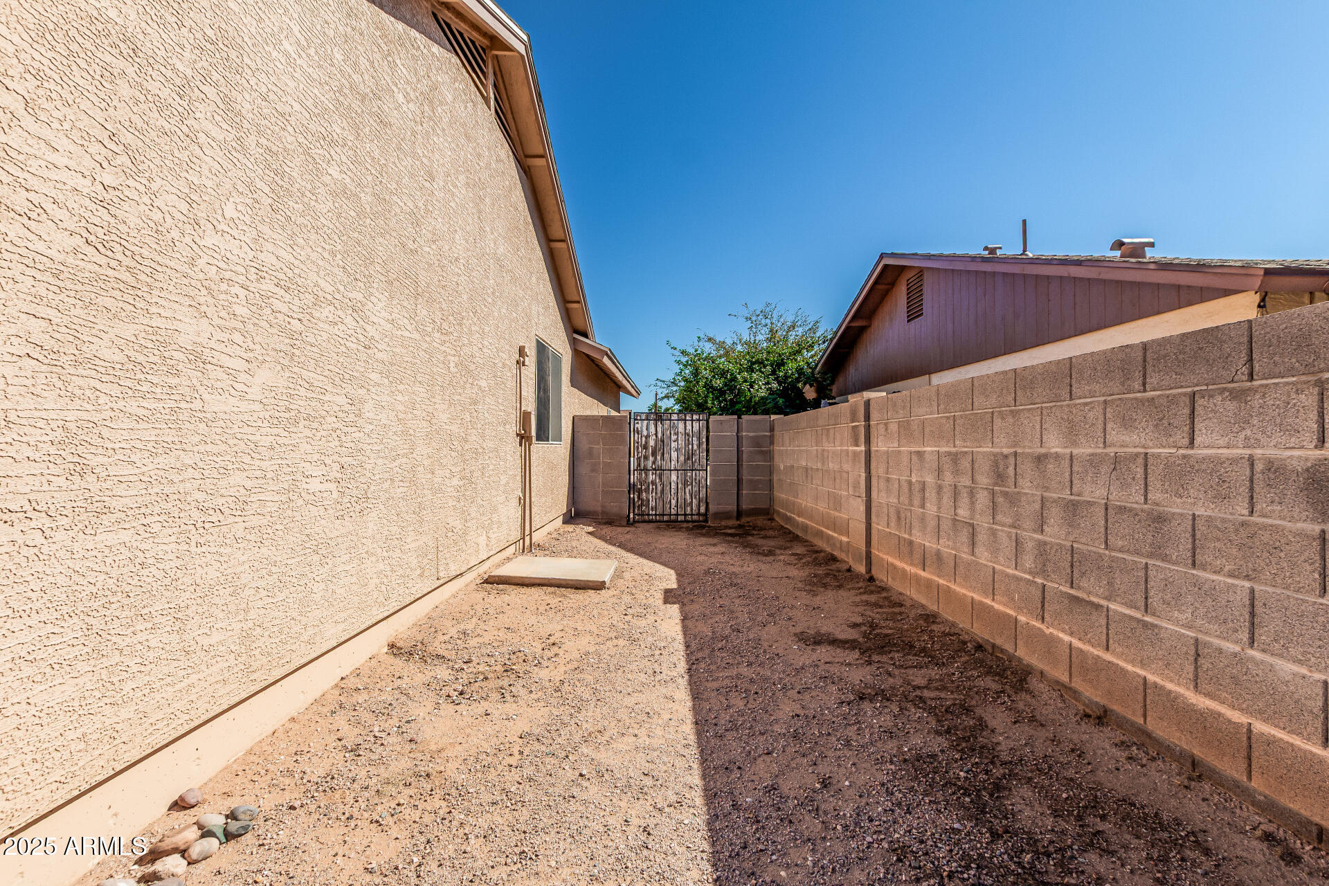 2264 South Belair Road Apache Junction, AZ 85119 - Photo 19 of 19 a view of small space with a wrought fence