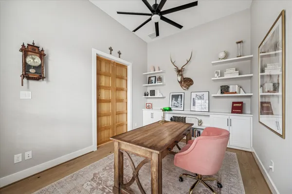 a view of a livingroom with furniture and window