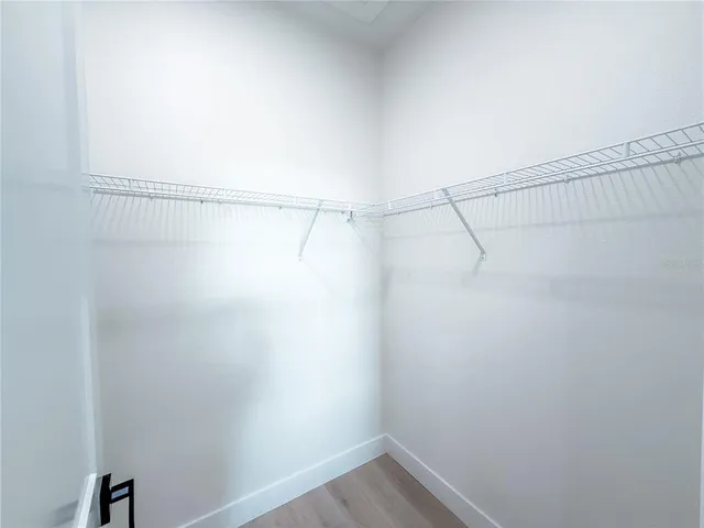 a view of a room with racks on the wall