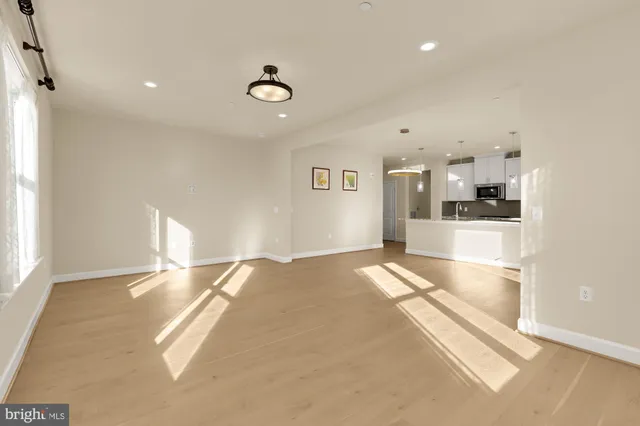 a view of a living room and a kitchen