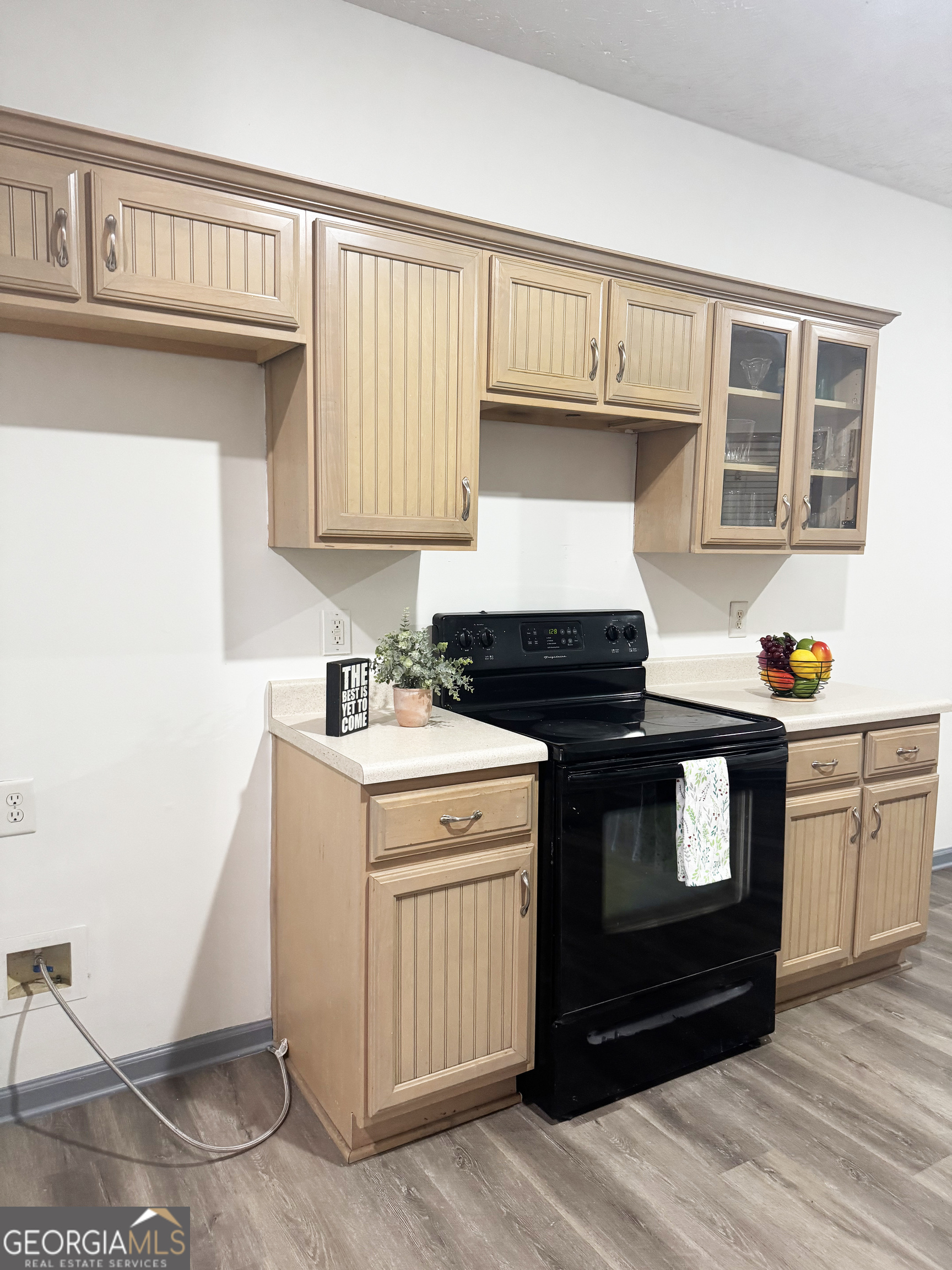 314 Hickory Road Jackson, GA 30233 - Photo 11 of 23 a kitchen with a stove cabinets and a window