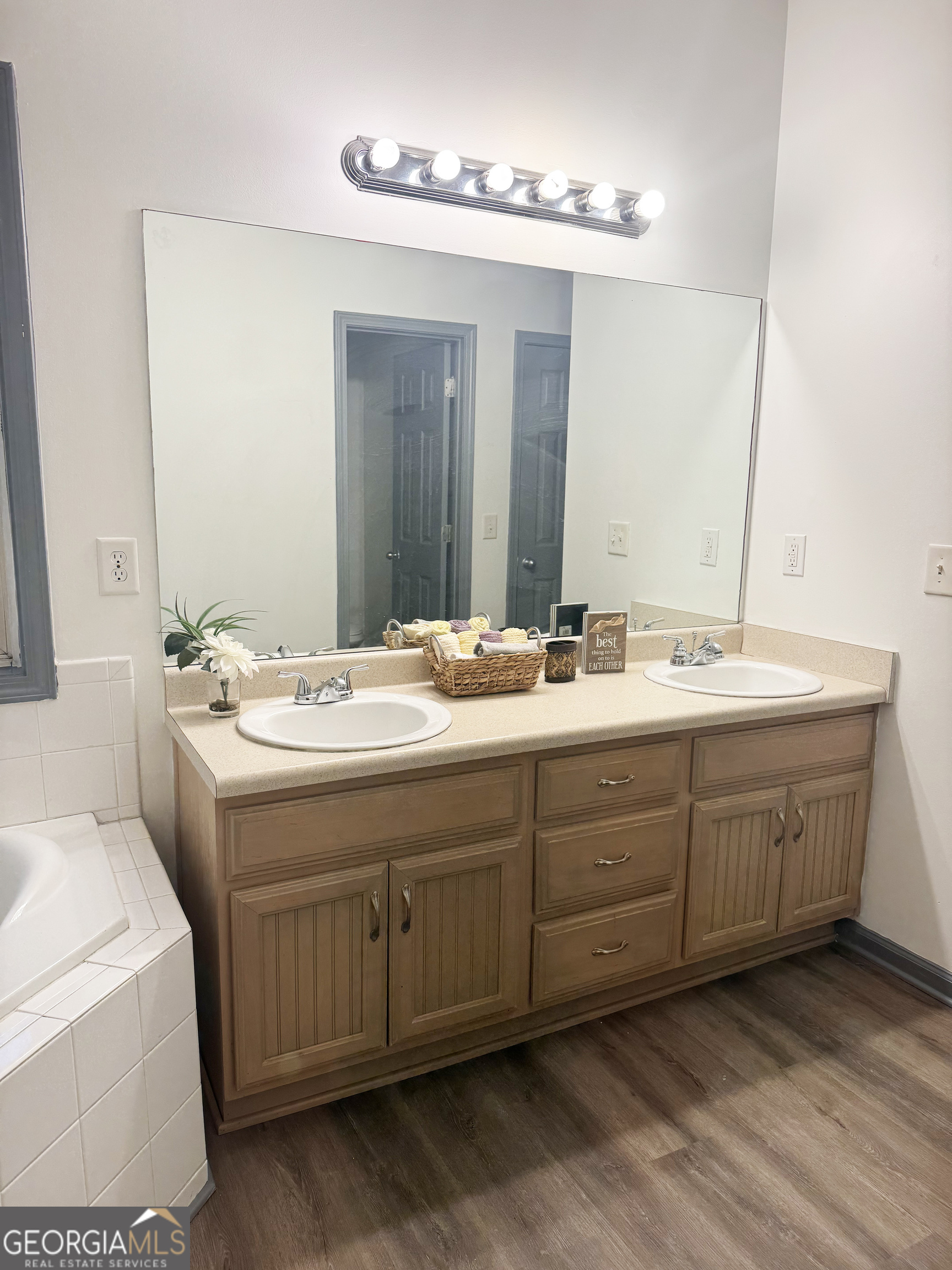 314 Hickory Road Jackson, GA 30233 - Photo 15 of 23 a bathroom with a double vanity sink and a mirror