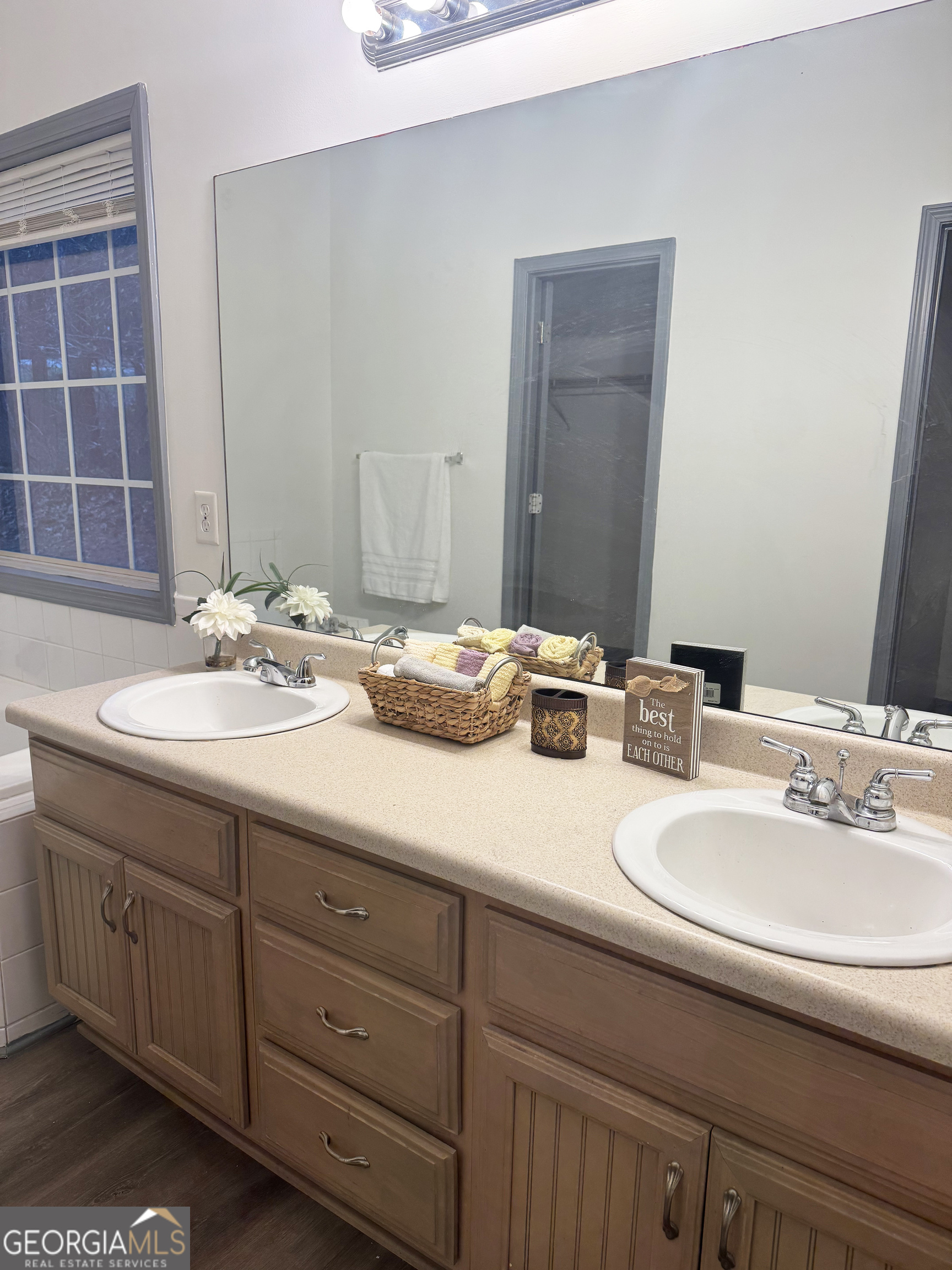 314 Hickory Road Jackson, GA 30233 - Photo 16 of 23 a bathroom with a double vanity sink and a mirror