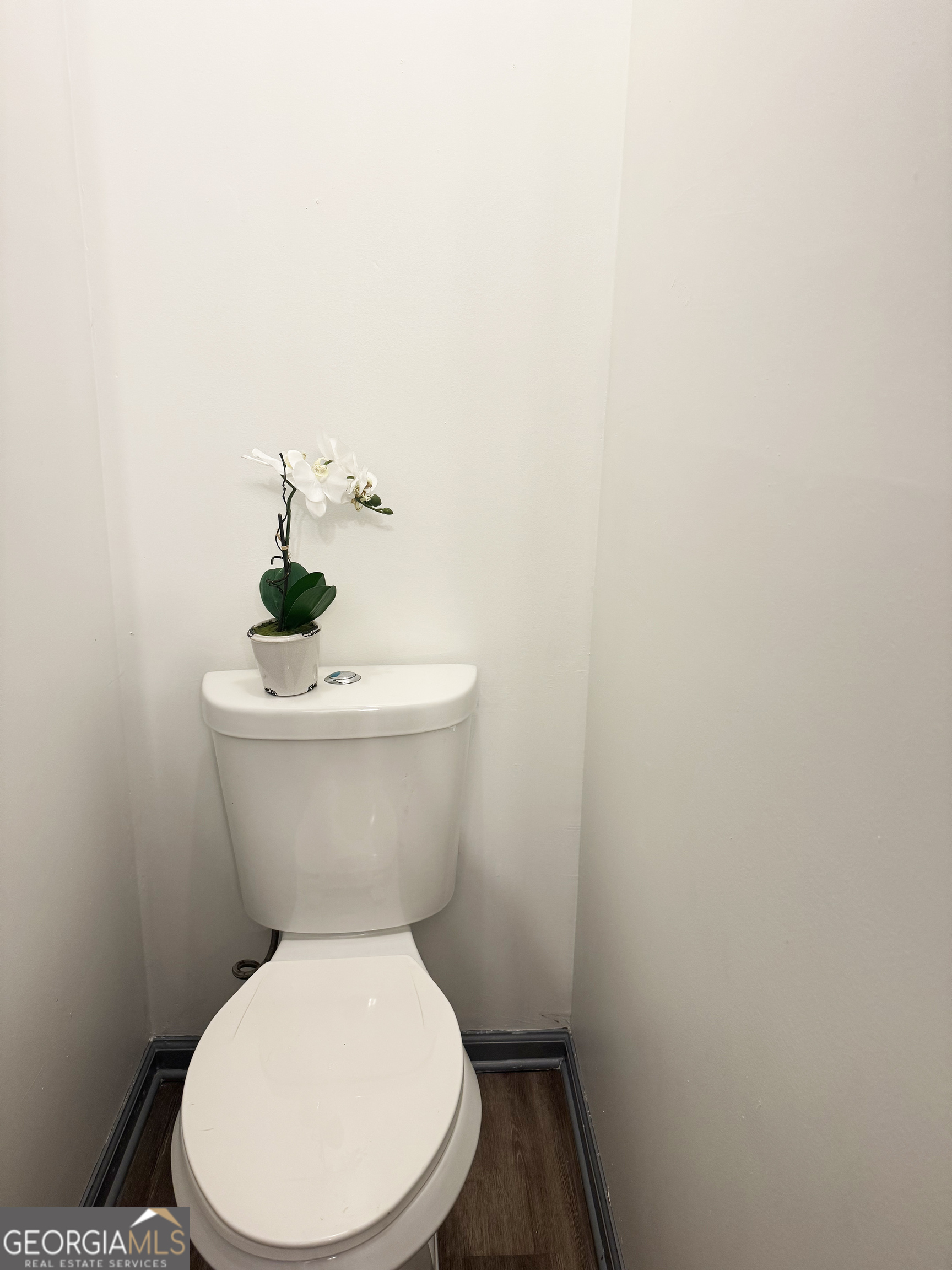 314 Hickory Road Jackson, GA 30233 - Photo 17 of 23 a white toilet sitting next to a white sink