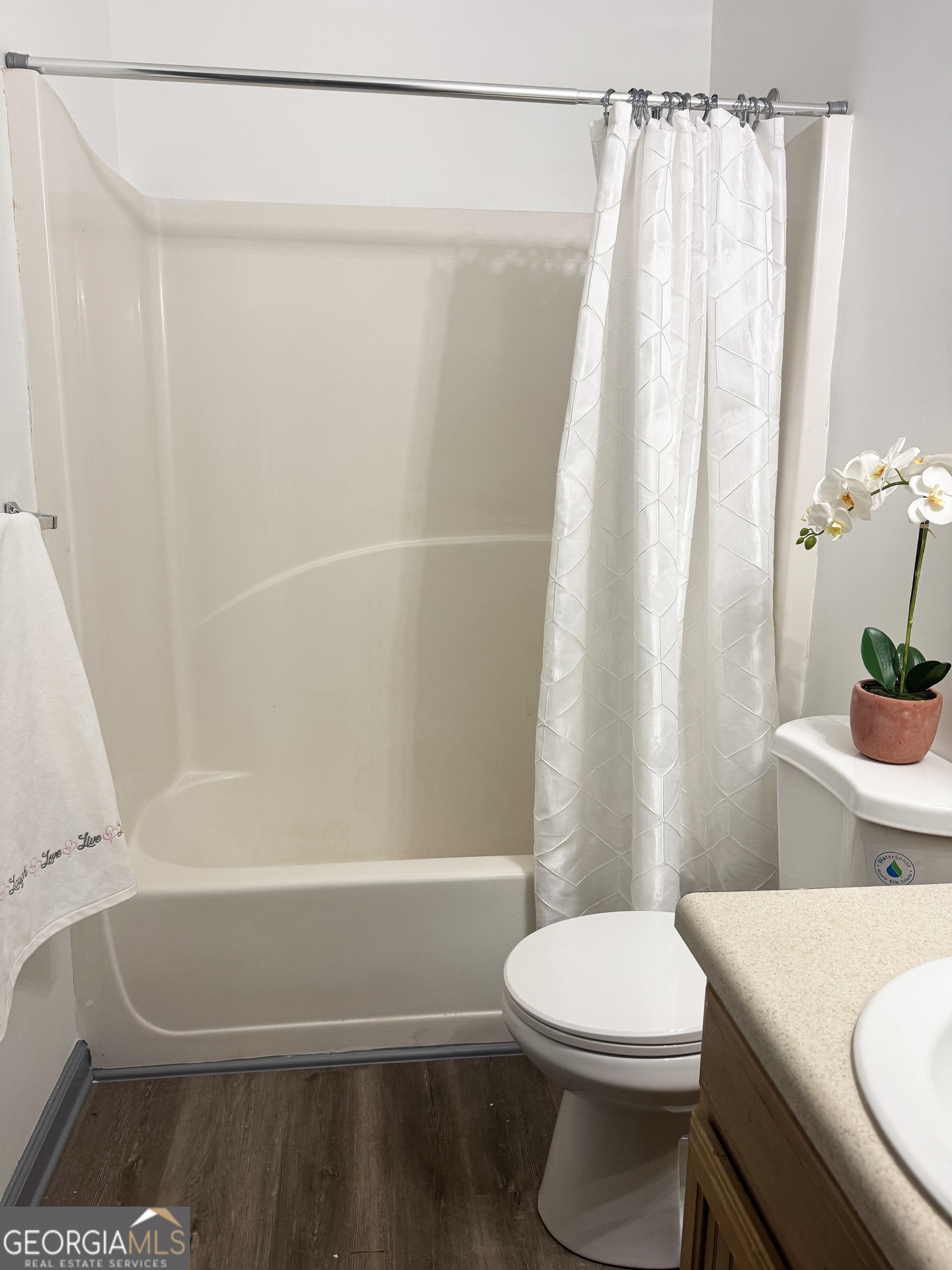 314 Hickory Road Jackson, GA 30233 - Photo 19 of 23 a bathroom with a toilet and a shower