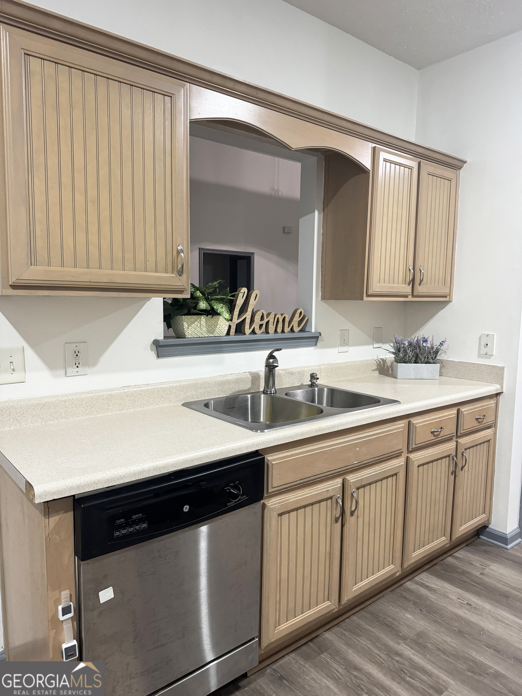 314 Hickory Road Jackson, GA 30233 - Photo 9 of 23 a kitchen with a sink and cabinets