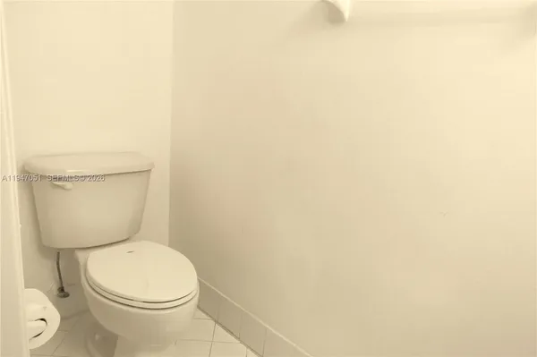a bathroom with a sink and vanity
