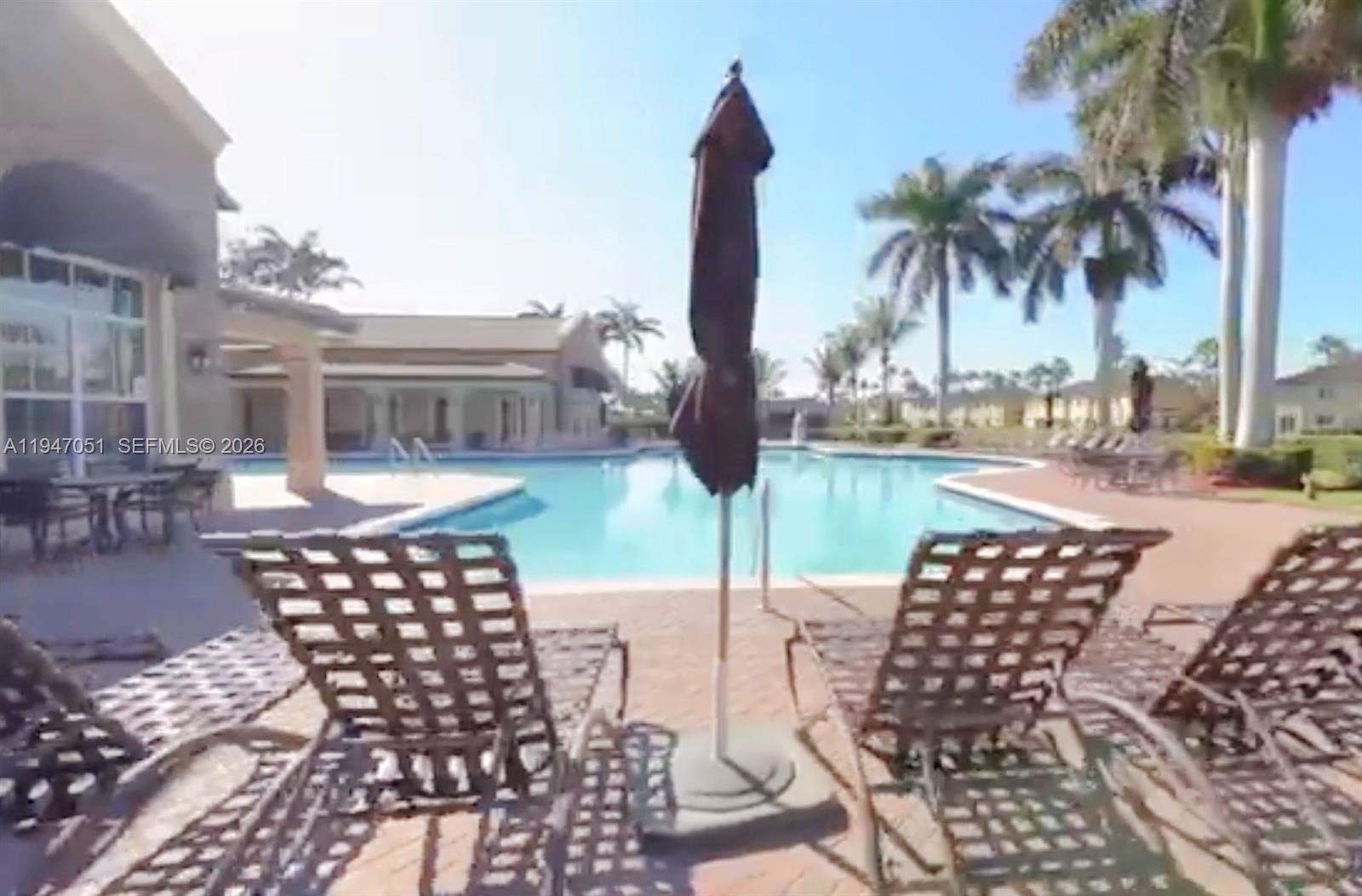 1485 Northeast 33rd Road, Unit 1011 Homestead, FL 33033 - Photo 4 of 7 a view of outdoor space yard and patio