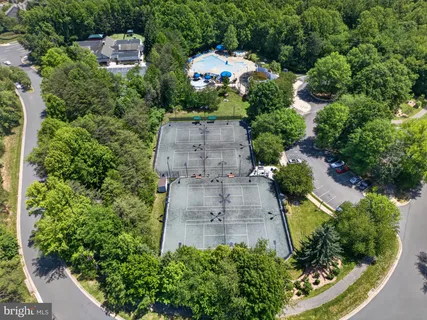 an aerial view of a house with a garden