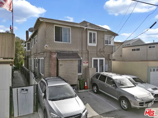 a car parked in front of a house