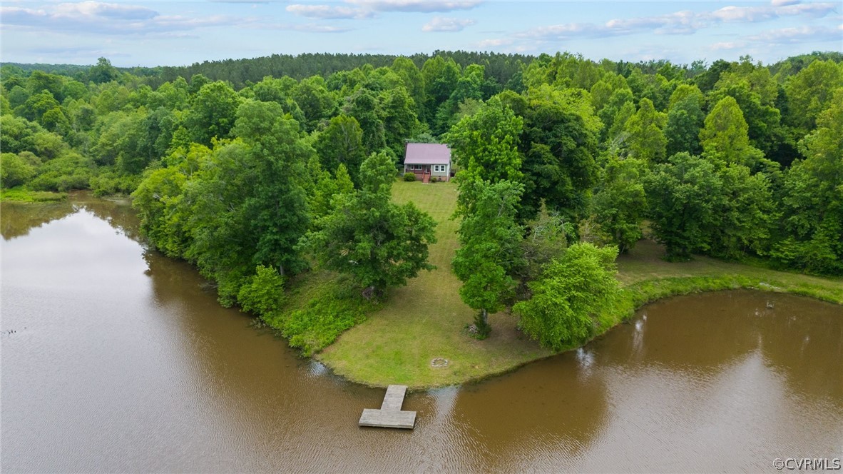 a view of a lake with a yard