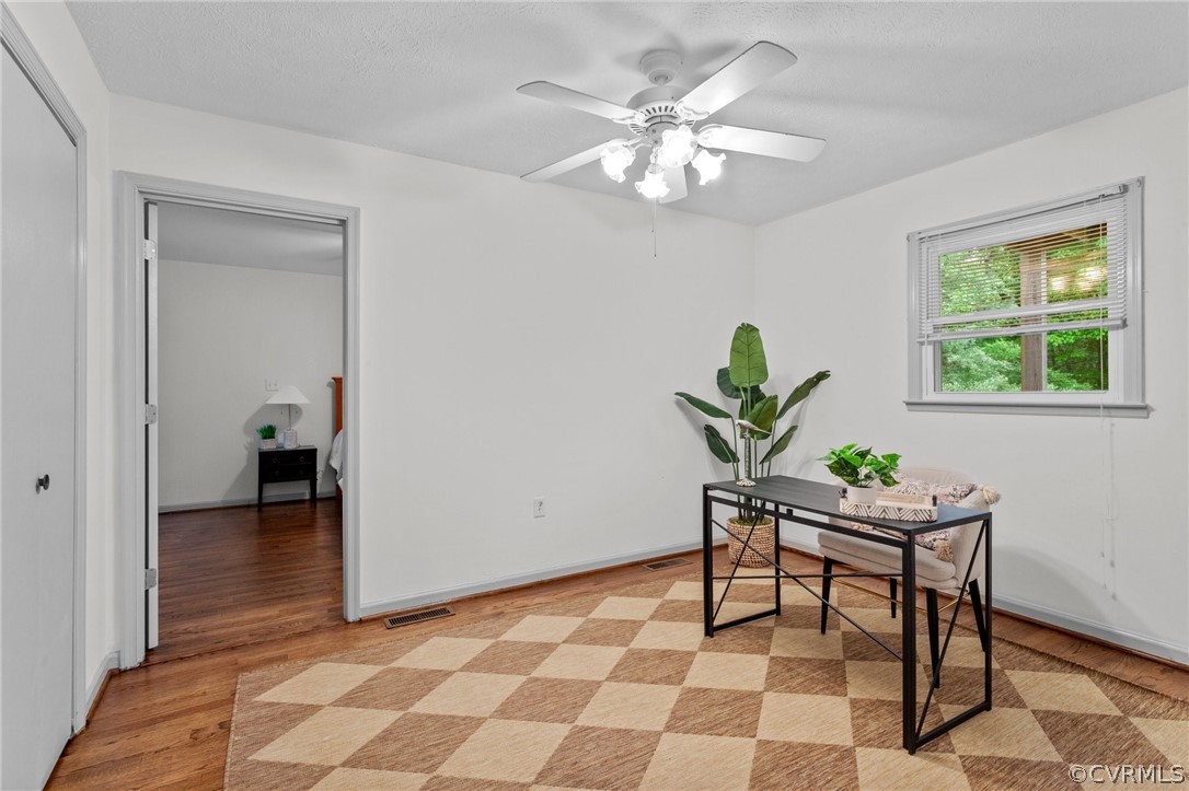 1692 Miller Lk Road Rice, VA 23966 - Photo 27 of 35 a view of a workspace with furniture and a chandelier