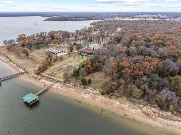 a view of a yard with trees