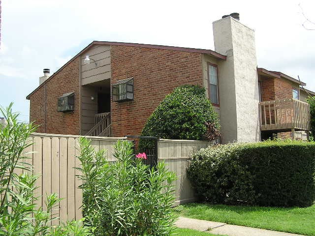 9101 Country Creek Street, Unit 403 Houston, TX 77074 - Photo 7 of 11 a backyard of a house with lots of green space