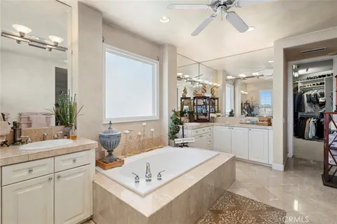a view of a bathroom sink and a mirror
