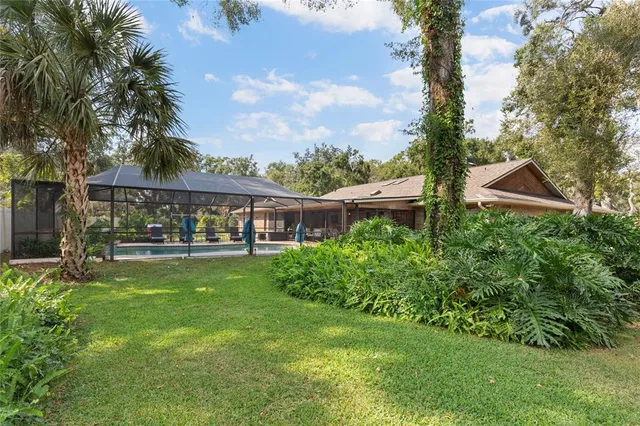 a view of a tree in front of a house