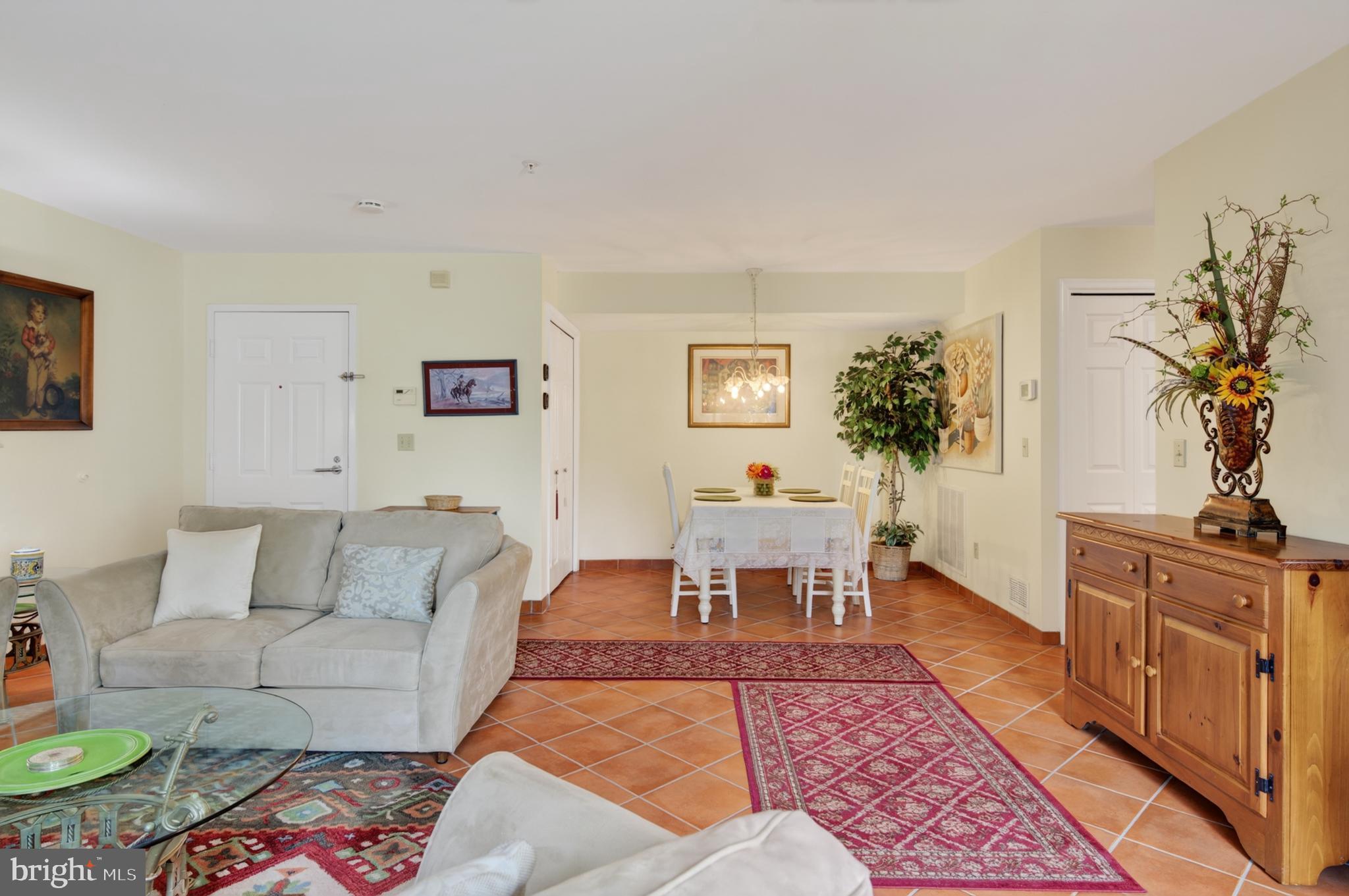 936 Bay Ridge Avenue, Unit 201 Annapolis, MD 21403 - Photo 12 of 40 a living room with furniture and a couch