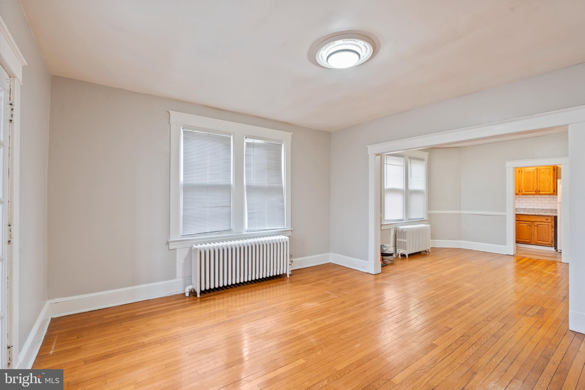 639 Plymouth Road Baltimore, MD 21229 - Photo 3 of 16 an empty room with windows and closet