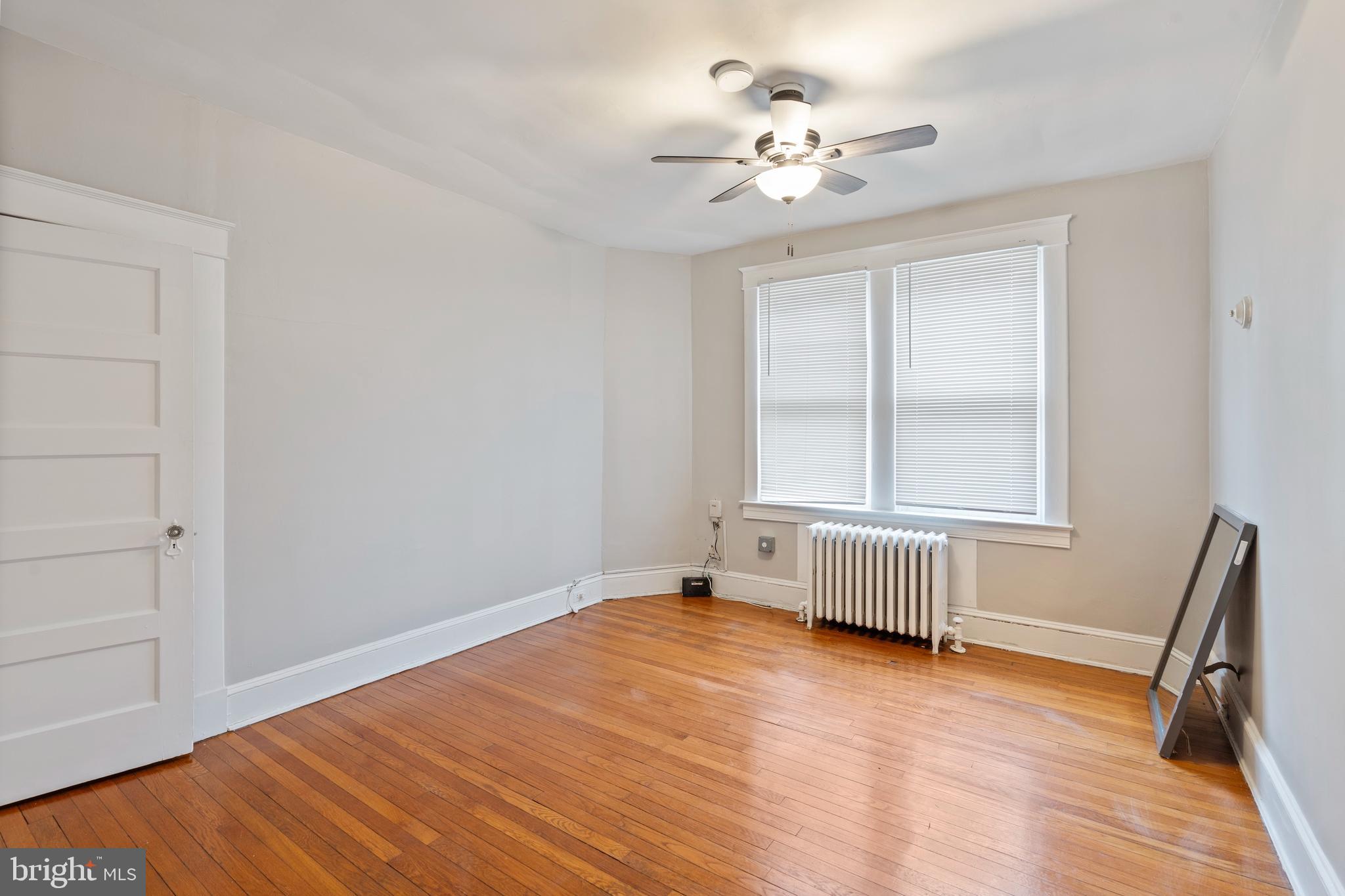 639 Plymouth Road Baltimore, MD 21229 - Photo 10 of 16 a view of an empty room with a window