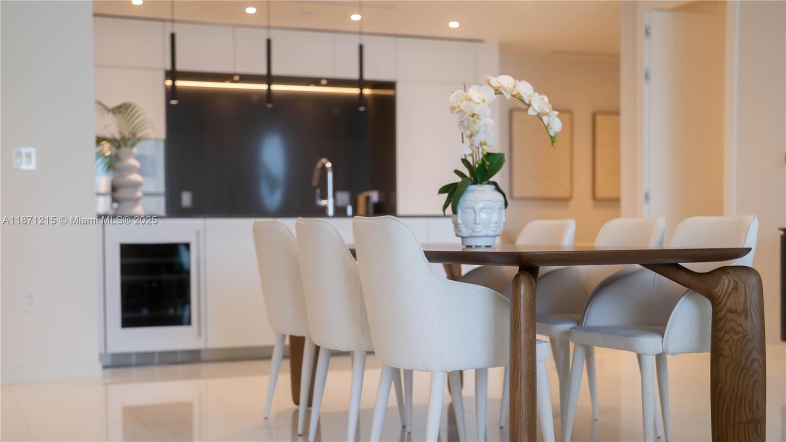 300 Biscayne Blvd Way, Unit 503C Miami, FL 33131 - Photo 15 of 64 a kitchen with stainless steel appliances a refrigerator and wooden floor
