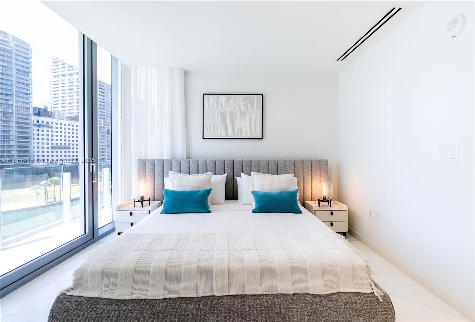 300 Biscayne Blvd Way, Unit 503C Miami, FL 33131 - Photo 18 of 64 a bedroom with a bed and large window