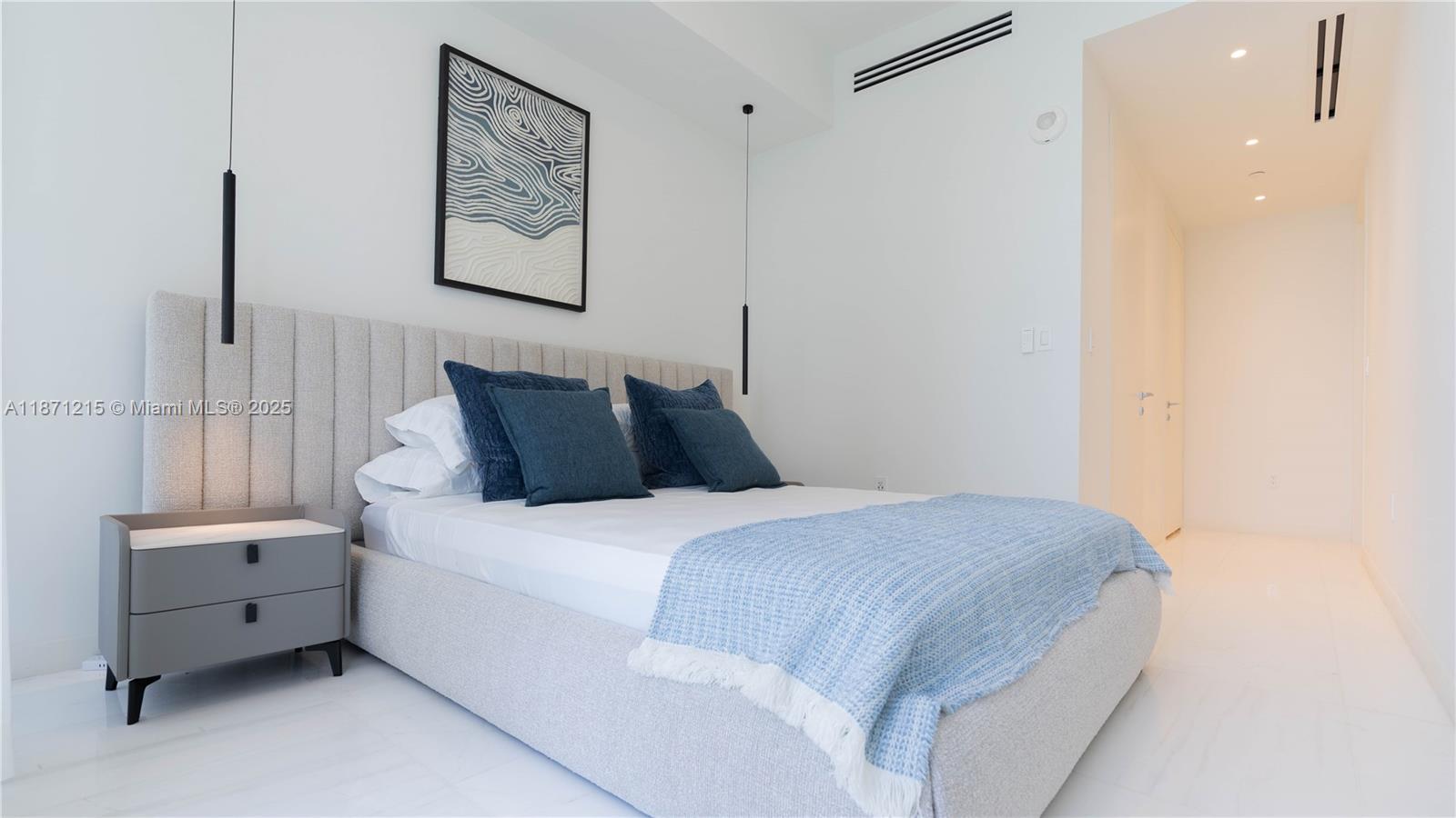 300 Biscayne Blvd Way, Unit 503C Miami, FL 33131 - Photo 31 of 64 a bedroom with a bed and a window