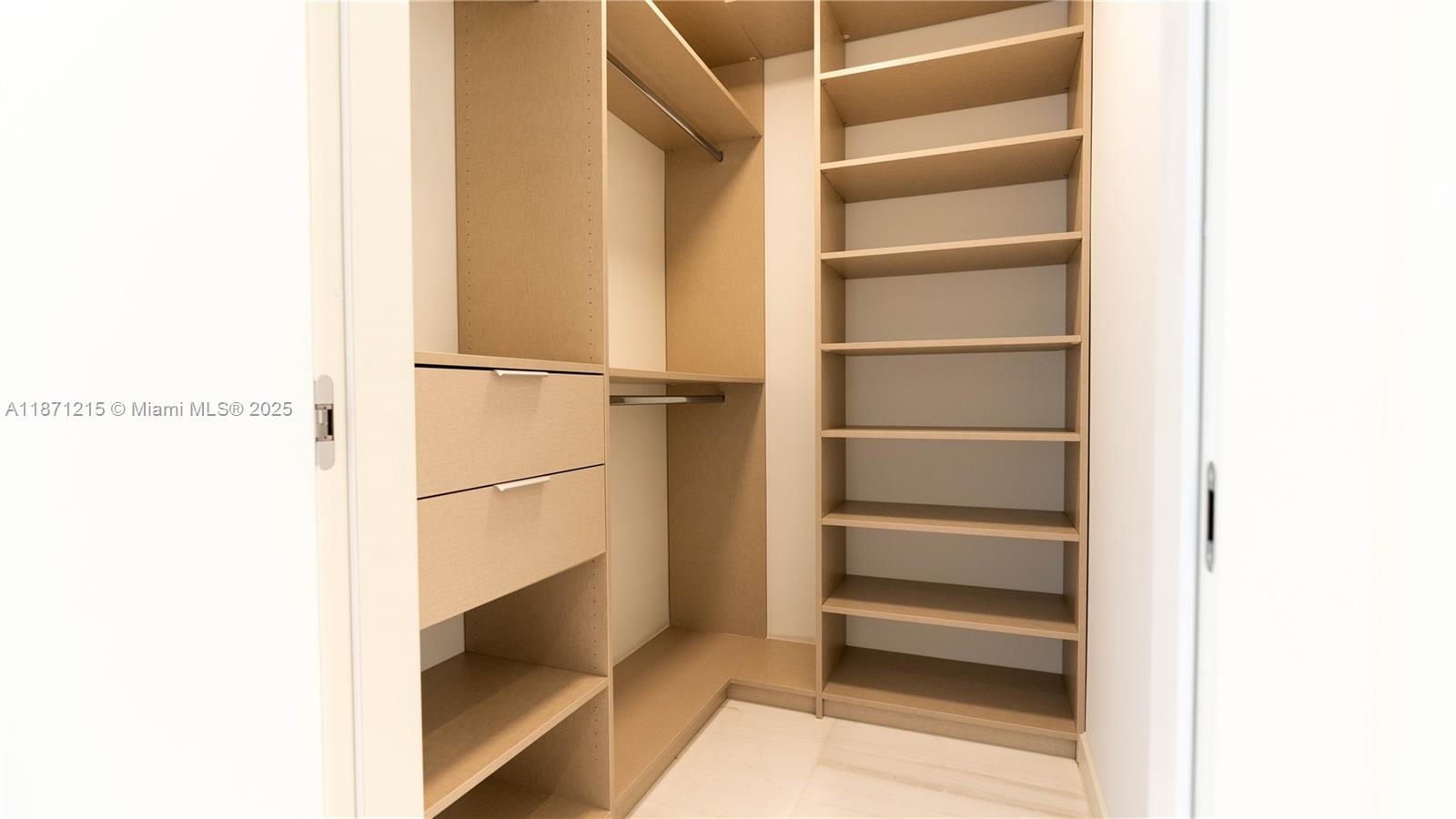 300 Biscayne Blvd Way, Unit 503C Miami, FL 33131 - Photo 33 of 64 a view of walk in closet with empty racks