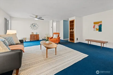 a kitchen with a sink cabinets and microwave