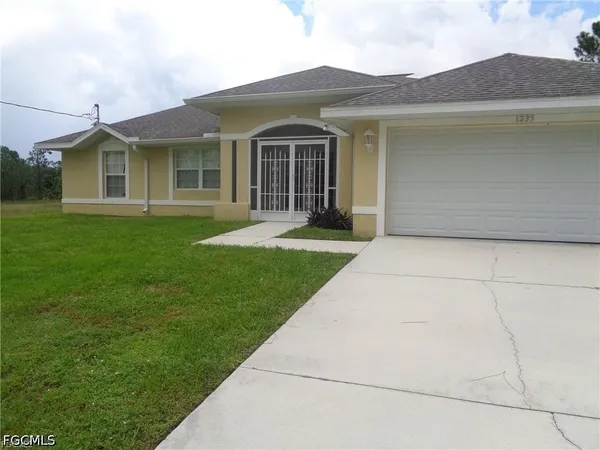 $284,900 | 1235 Cloplon Street East, Lehigh Acres, FL 33974