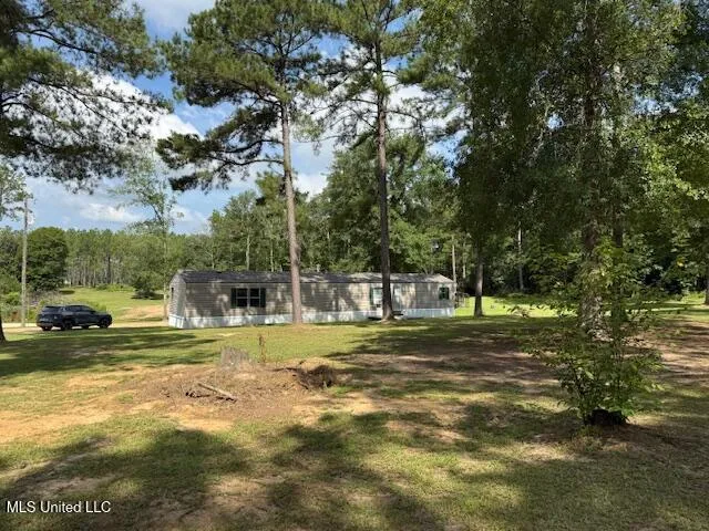 $320,000 | 401 Montgomery Road Southwest, Summit, MS 39666