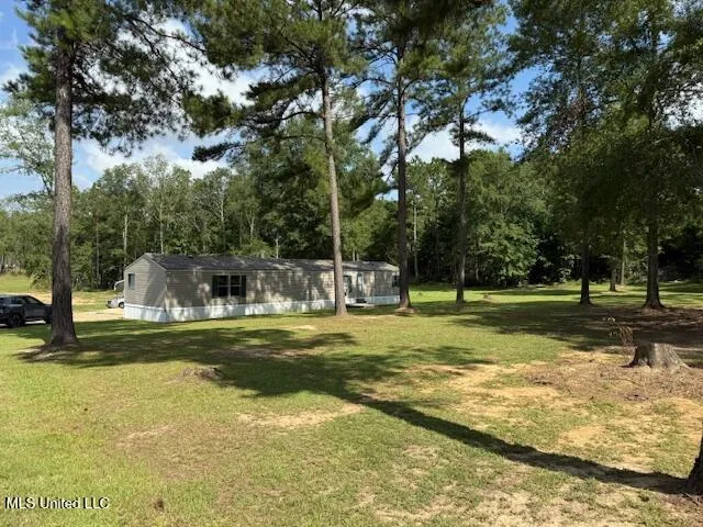 $320,000 | 401 Montgomery Road Southwest, Summit, MS 39666