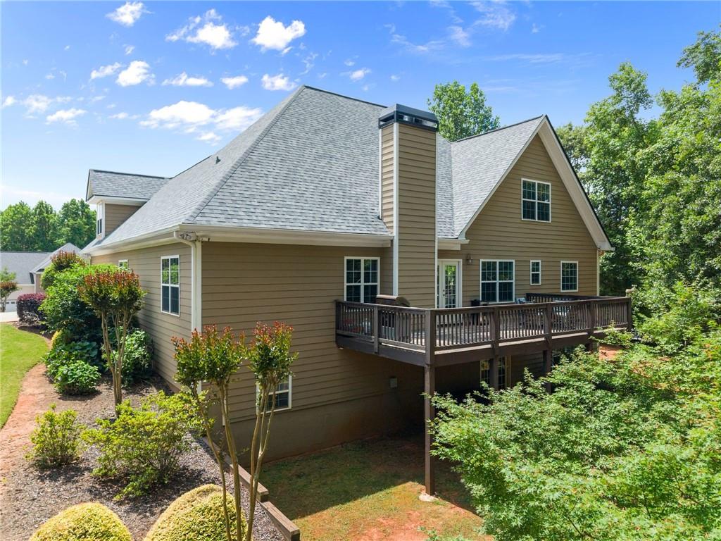 6643 Windvane Point Clermont, GA 30527 - Photo 61 of 88 a front view of a house with a porch