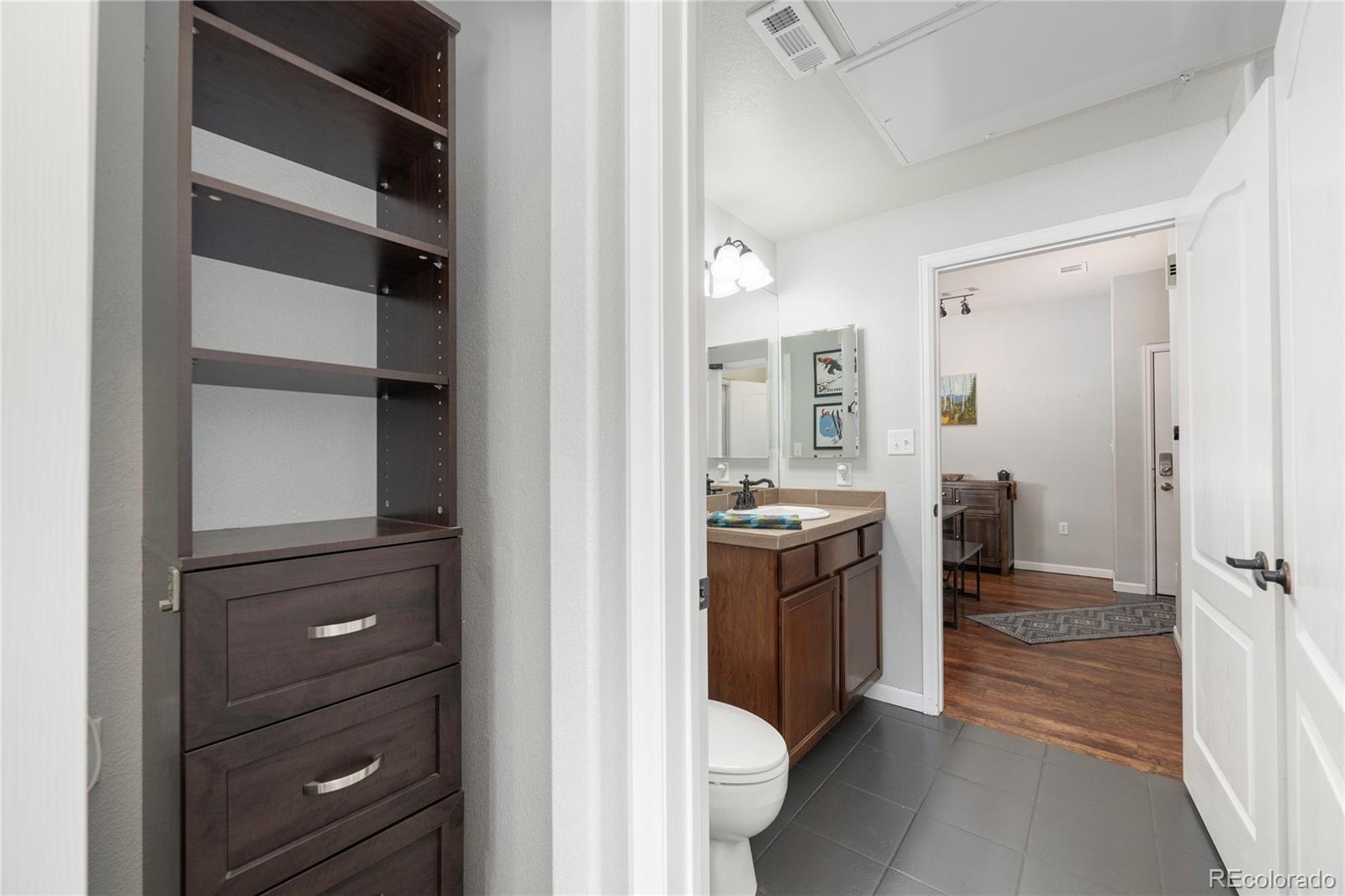 154 Village Road, Unit C103 Granby, CO 80446 - Photo 13 of 39 walk in closet with view of bathroom